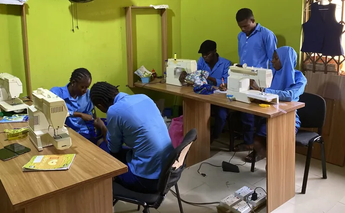 Learners practising sewing at SkillUp Africa Garage