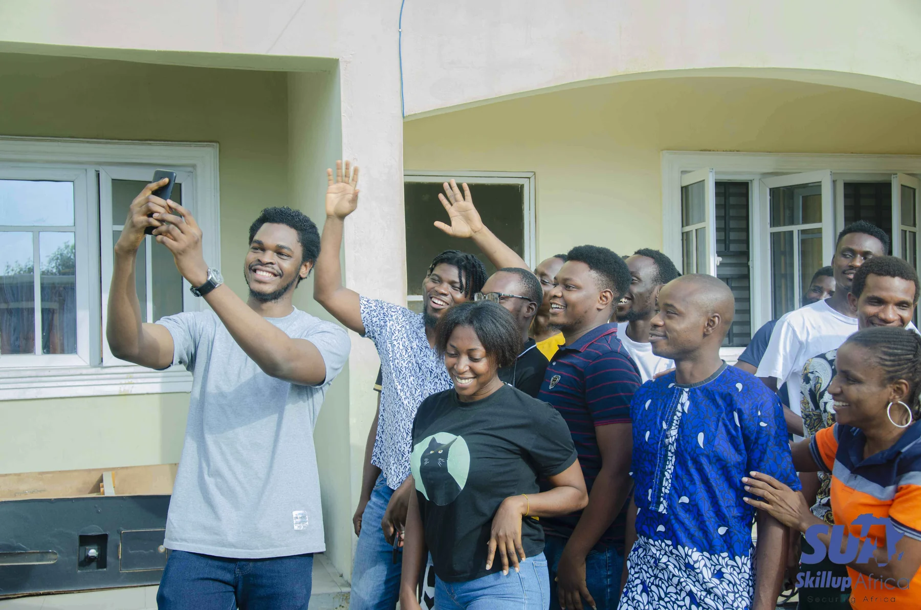SkillUp Africa participants gathering for a joyful group selfie